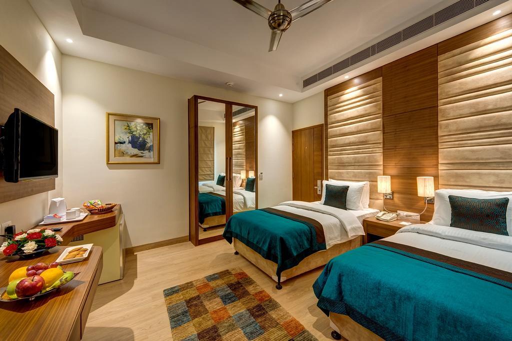 Hotel The Astor Kalkutta Zimmer foto
